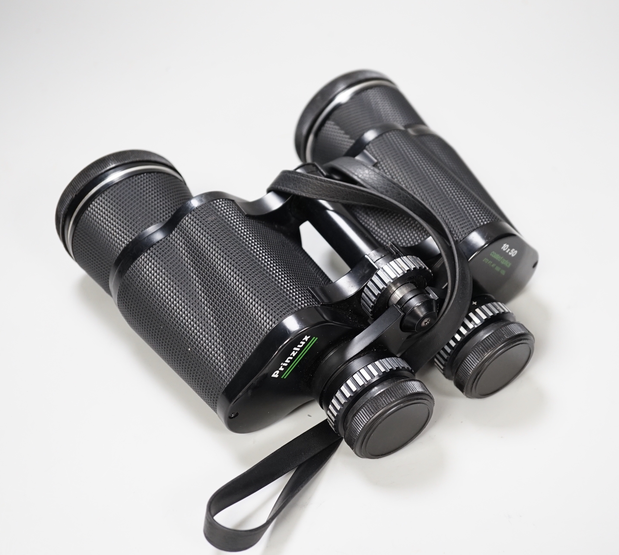 A pair of Prinzlux binoculars 10 x 50 and a pair of Tasco binoculars 20 x 60